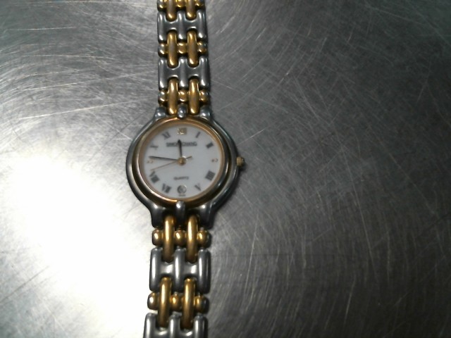 Montre quartz vintage pour femme 2 tone