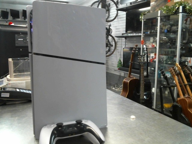 Ps5 slim avec manette et cable