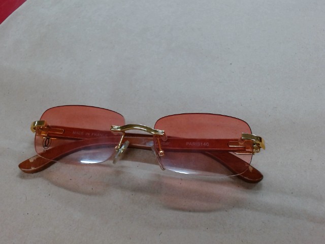 Lunettes cartier monture bois/dor�
