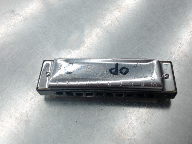 Harmonica avec autocollant marque c do
