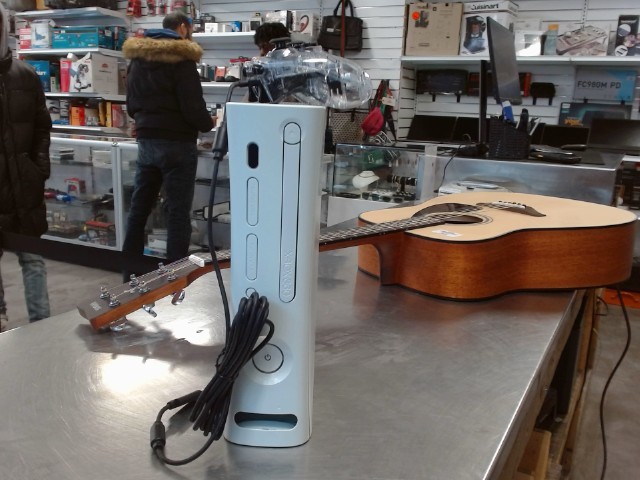 Xbox 360 console without accessories.