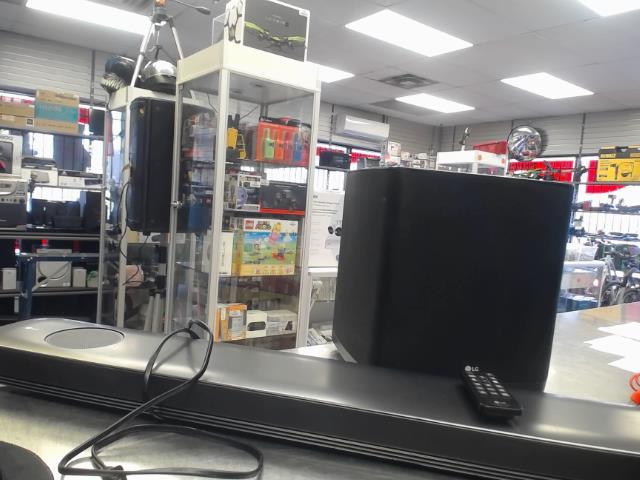 Sound bar lg + subwoofer + manette