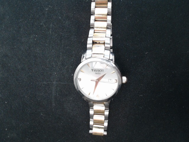 Montre gold tone et stainless quartz