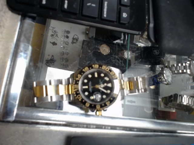 Montre automatique couleur or et argent