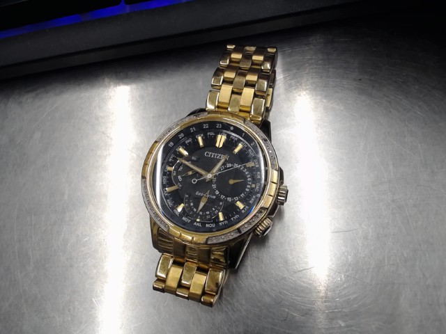 Montre citizen couleur gold avec pierres