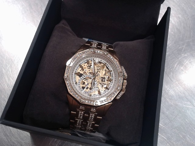 Bulova gold tone automatic see through