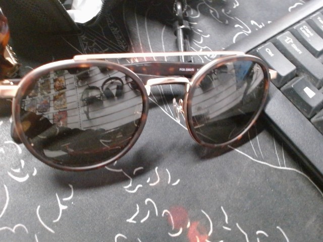 Lunette soleil fosiil