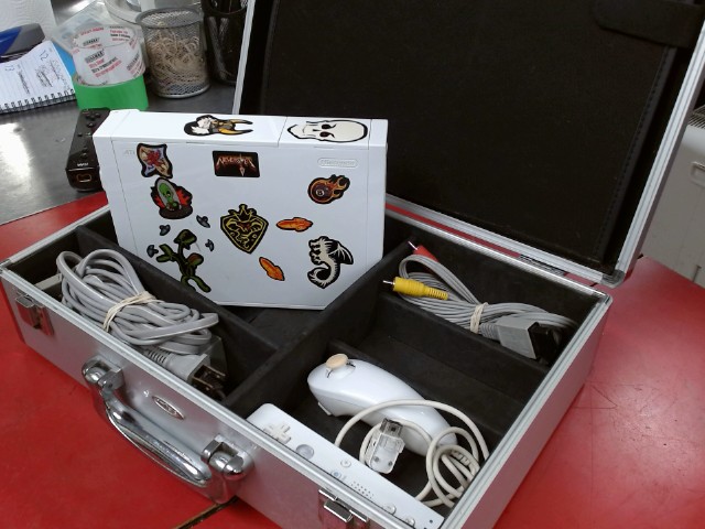 Console wii+manette+nunchuk+fil+case