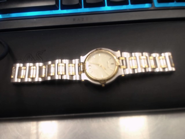 Montre gucci 2 tons pour femme