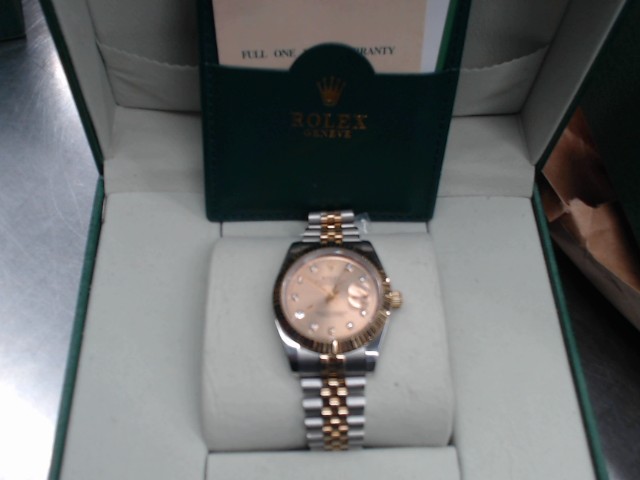 Fake rolex avec boite