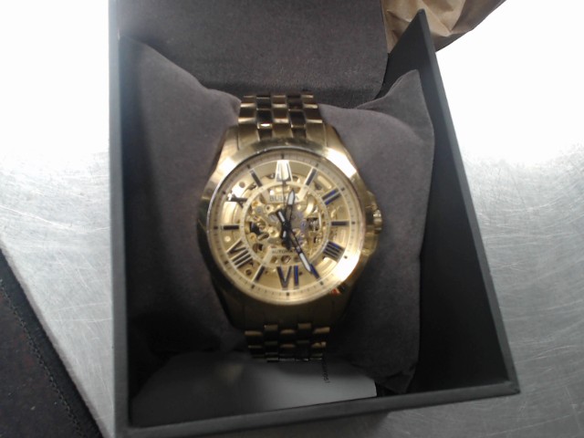 Montre bulova en or automatique + boitie