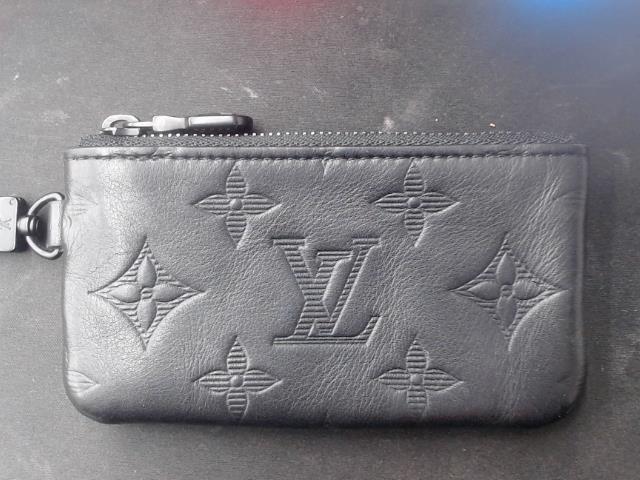 Monogram key holder small leather bag