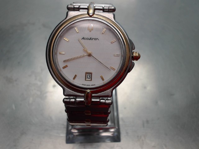 Montre stainless et gold tone swiss