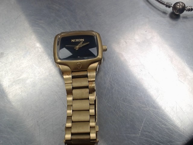 Nixon small player gold tone