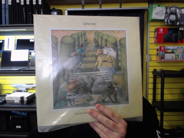 Genesis selling by the pound vinyl