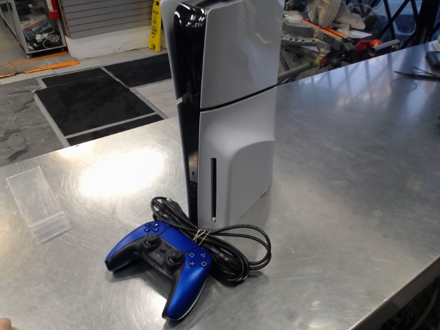 Console avec lecteur+man+fils 1tb blanch