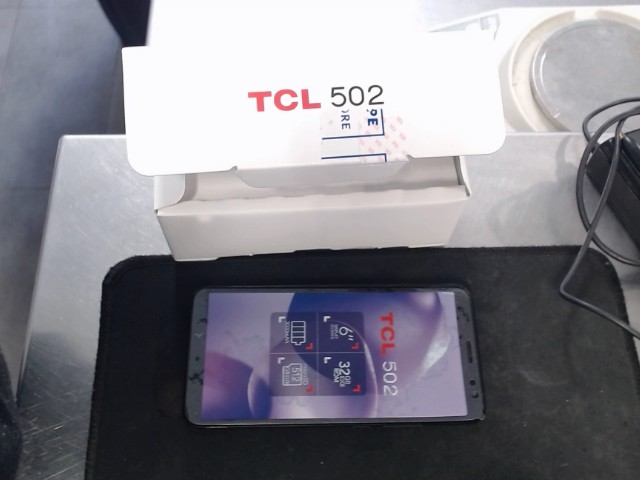 Tcl 502 cell phone with box