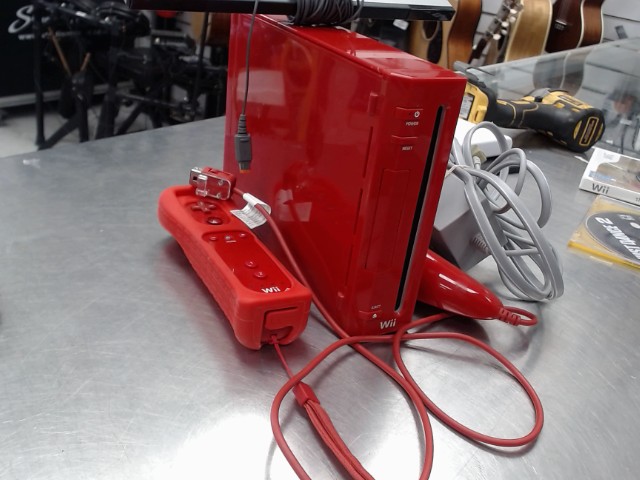 Wii rouge avec jeux et manettes/fils