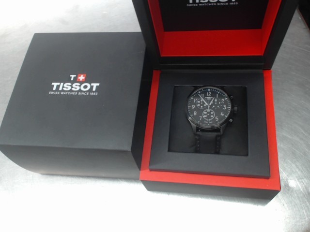 Montre tissot comme neuf dans boite