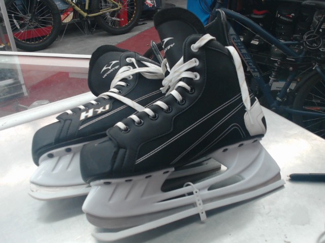 Patin a glace comme neuf 8us noir et bla