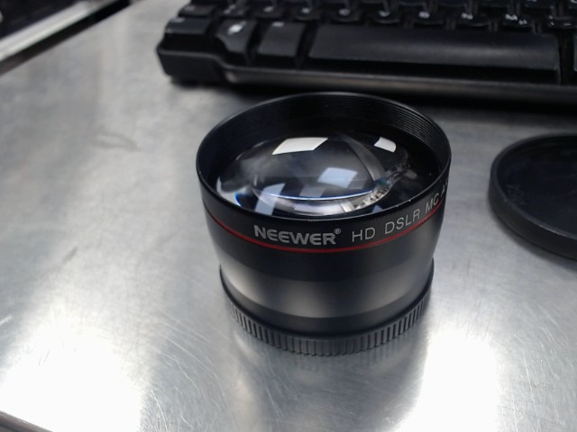 58mm telephoto lens with both caps
