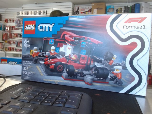 F1 pit stop & pit crew with ferrai car