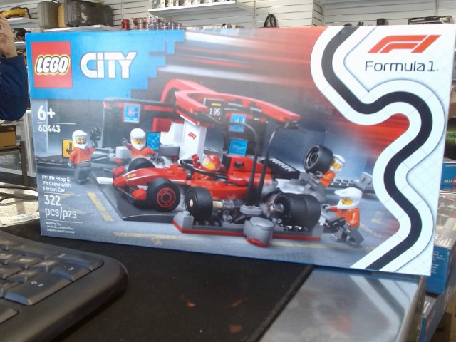 F1 pit stop& pit crew with ferrari car