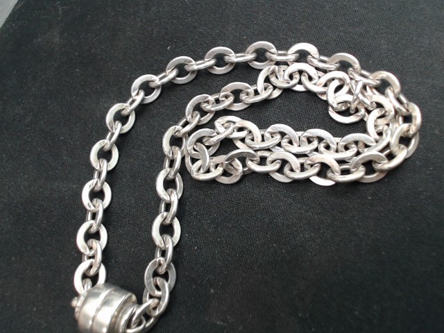 Collier en argent avec charm