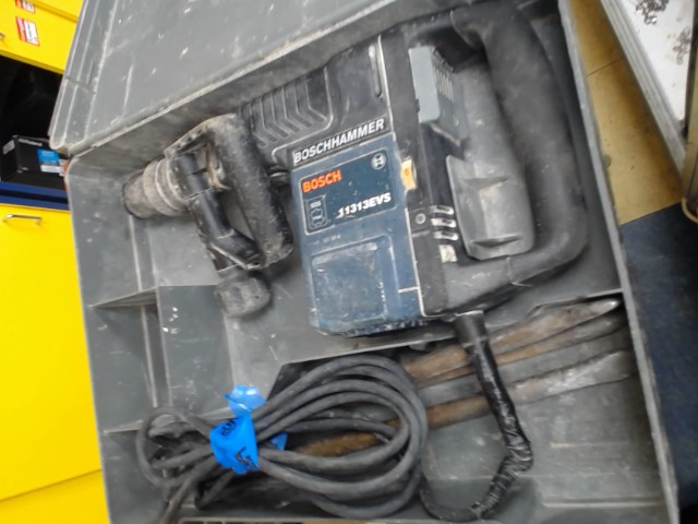 Demolition hammer with cables and case