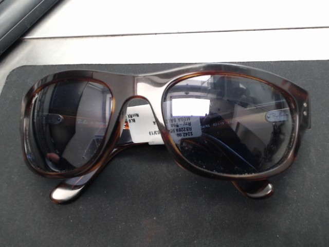 Luinettes soleil brune style mouche