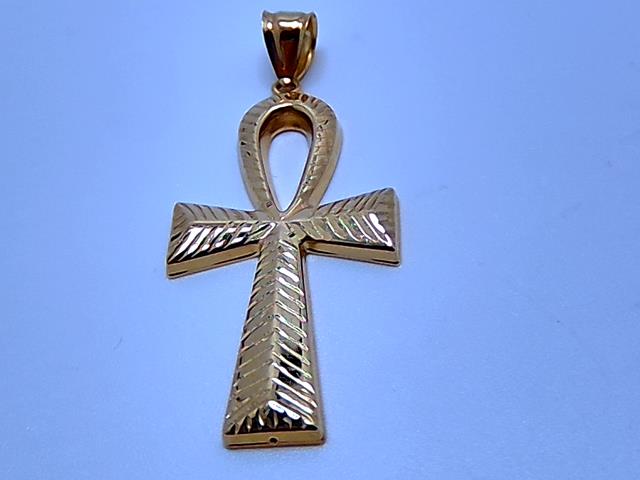 BRELOQUE EN OR 10KT NEW