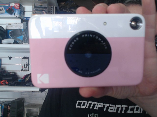 Kodak dans case gris et rouge