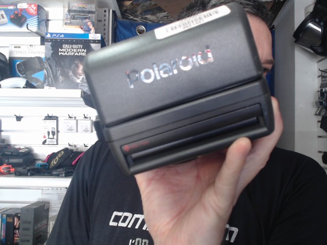 Camera polaroid one step dans son �tuit