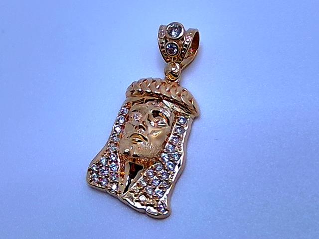 BRELOQUE EN OR 10KT NEW