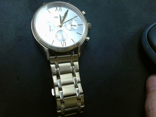 Montre homme or et argent