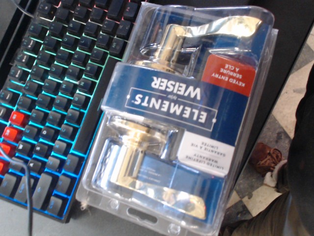 Poigner de porte avec serrure