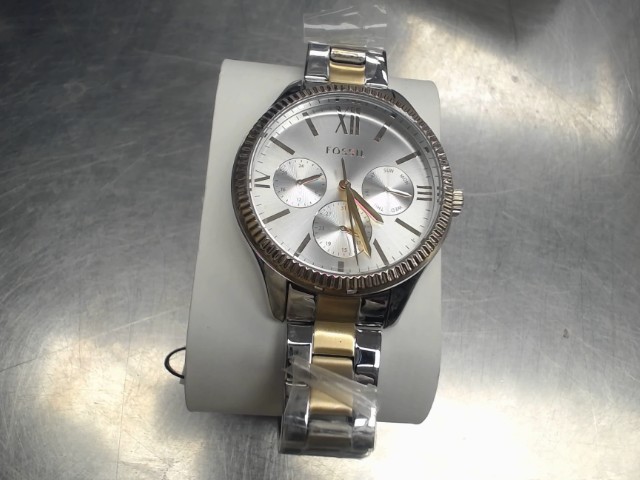 Montre fossile dans sa boite