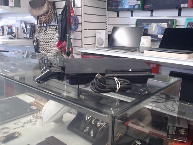 Ps3 avec fils et manettes + 5 jeux