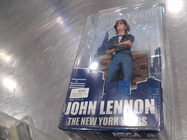 Figurine john lennon jamais d�baller