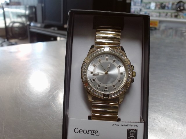 Montre gold fond blanc