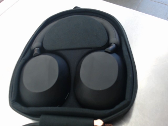 Ecouteurs bluetooth sony avec case et ac