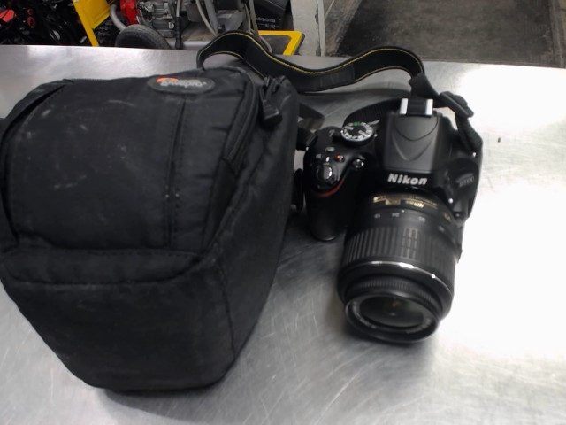 Nikon d5100 avec batt+charg+lens ds case