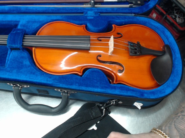 Violon dans case bleu