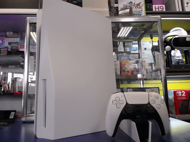 Console avec manette et chargeur