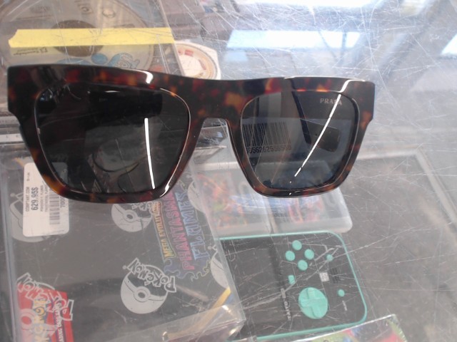 Prada sleek brown leopard sunglasses