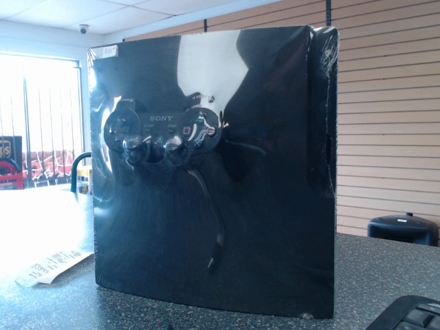 Ps3 slim 160gb avec fils et man