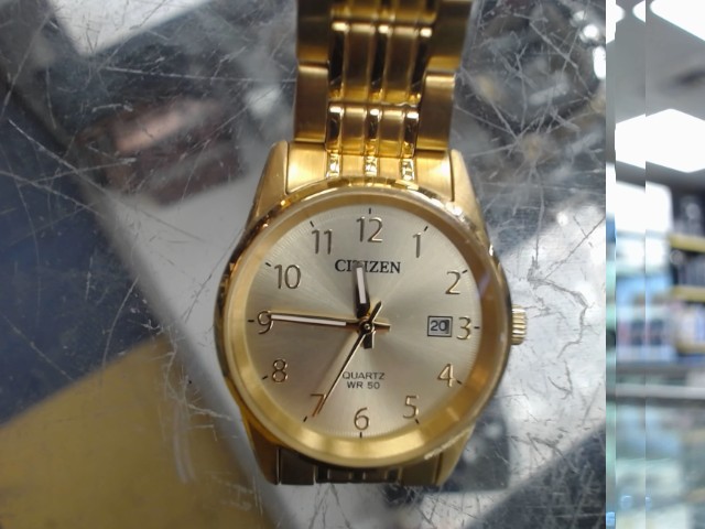 Montre dore pour femme