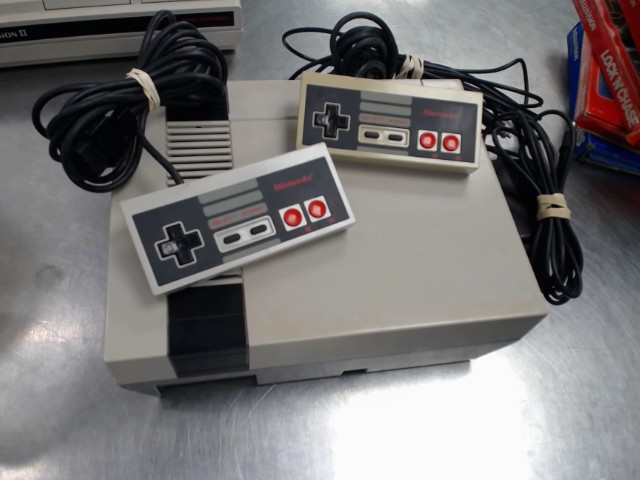 Nes console+2man+fils