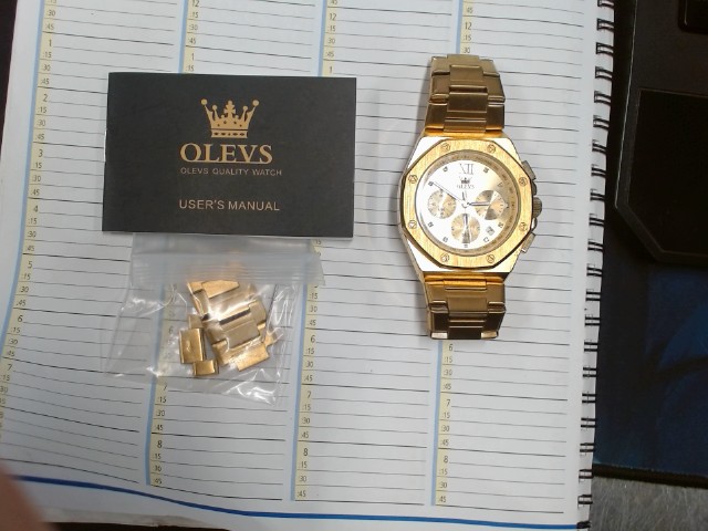 Montre olevs couleur gold avec acc