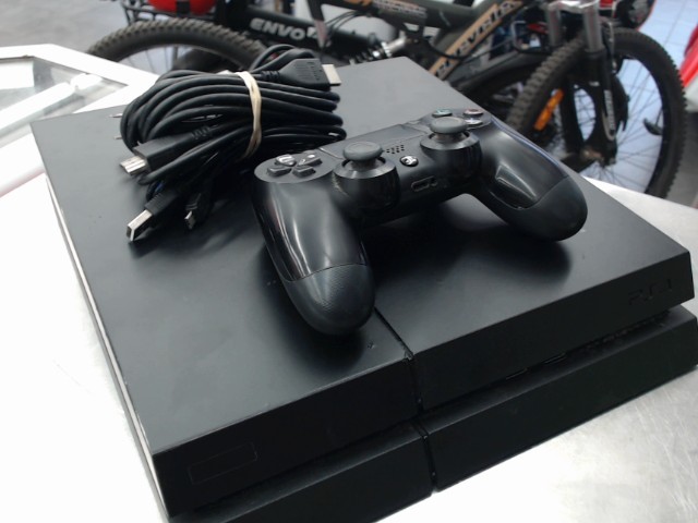 Console ps4 first gen + man +_ fils